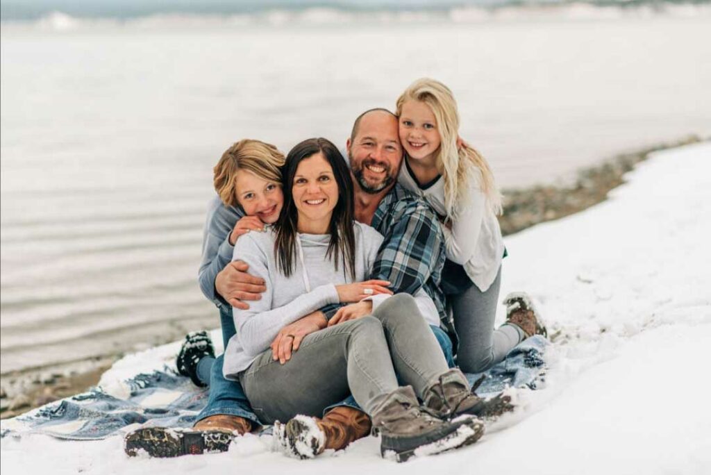 The Foster family posing for a photo.